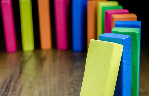 colorful dominoes falling